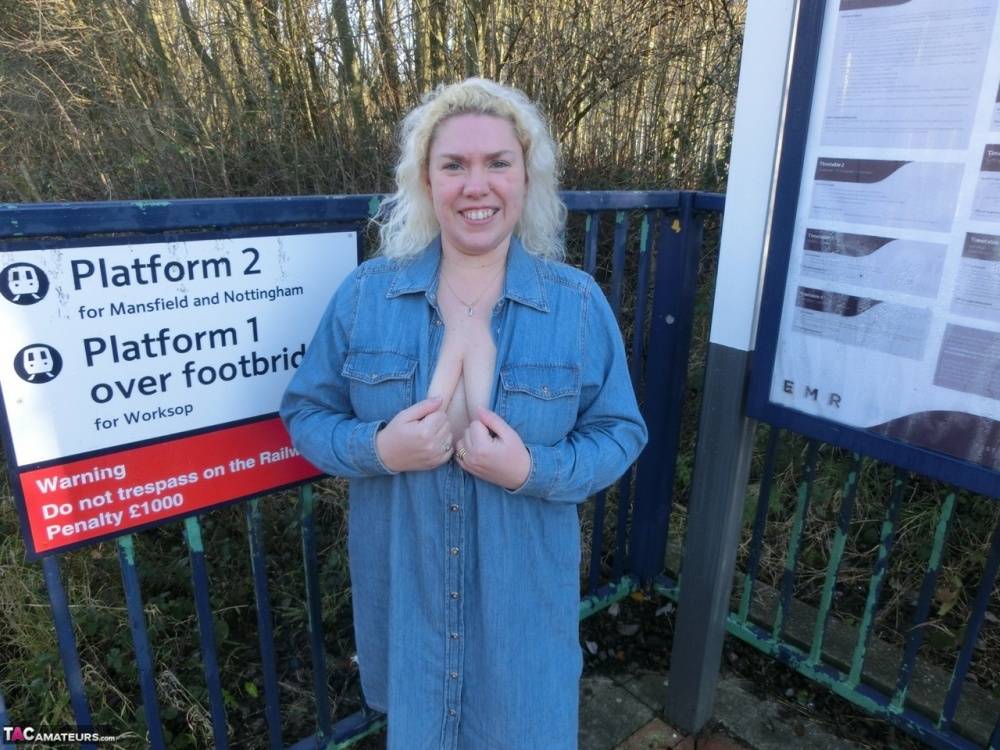 Older blonde Barby exposes her tits and pussy on a train station platform - #8