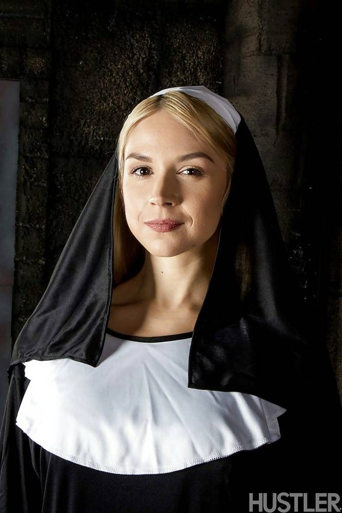 Blonde babe Sara Sloane strips off nun's uniform to expose big tits - #10