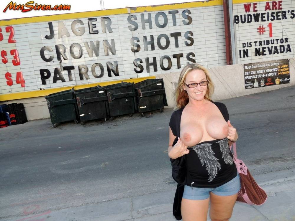 Big boobed mature blonde Dee Siren flashes her tits and goes naked in public - #14