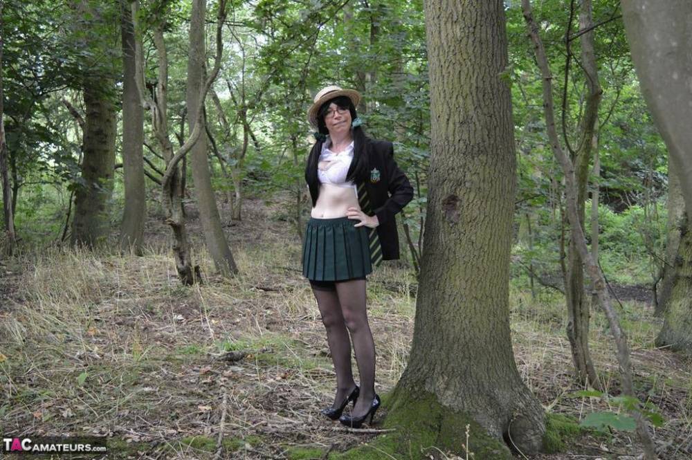 Older amateur Barby Slut exposes herself in the woods in schoolgirl apparel - #13