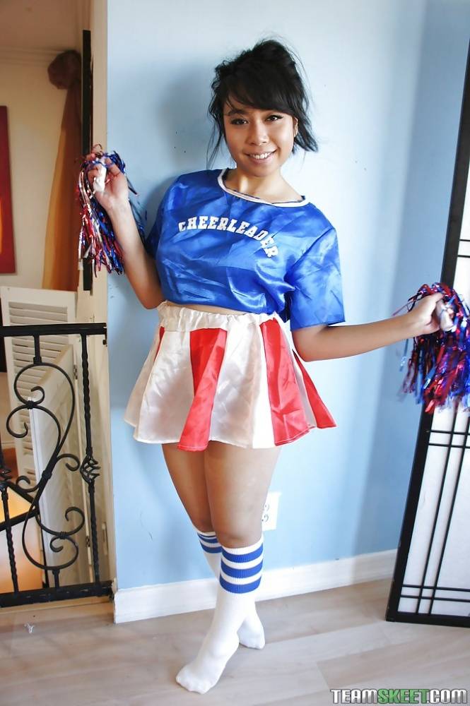 Petite Oriental cheerleader May Lee flashing black panties under skirt - #6