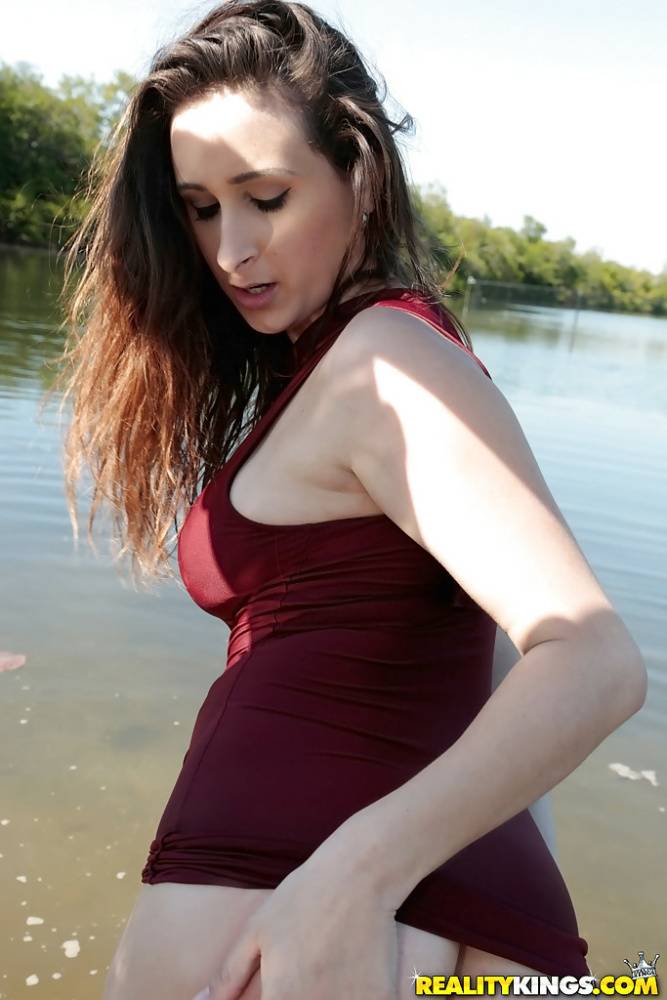 Busty teen chick Ashley Adams masturbating fully clothed beside lake - #6