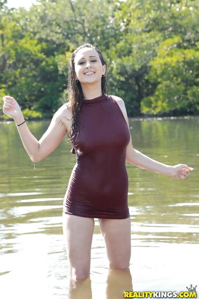 Busty teen chick Ashley Adams masturbating fully clothed beside lake - #7