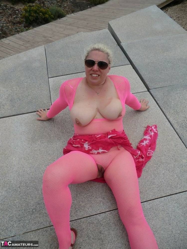 Aged lady Barby looses her big tits from a crotchless bodystocking by the sea - #8