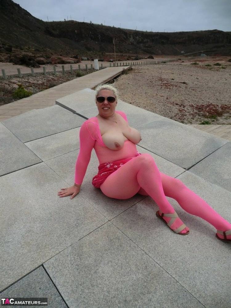 Aged lady Barby looses her big tits from a crotchless bodystocking by the sea - #2