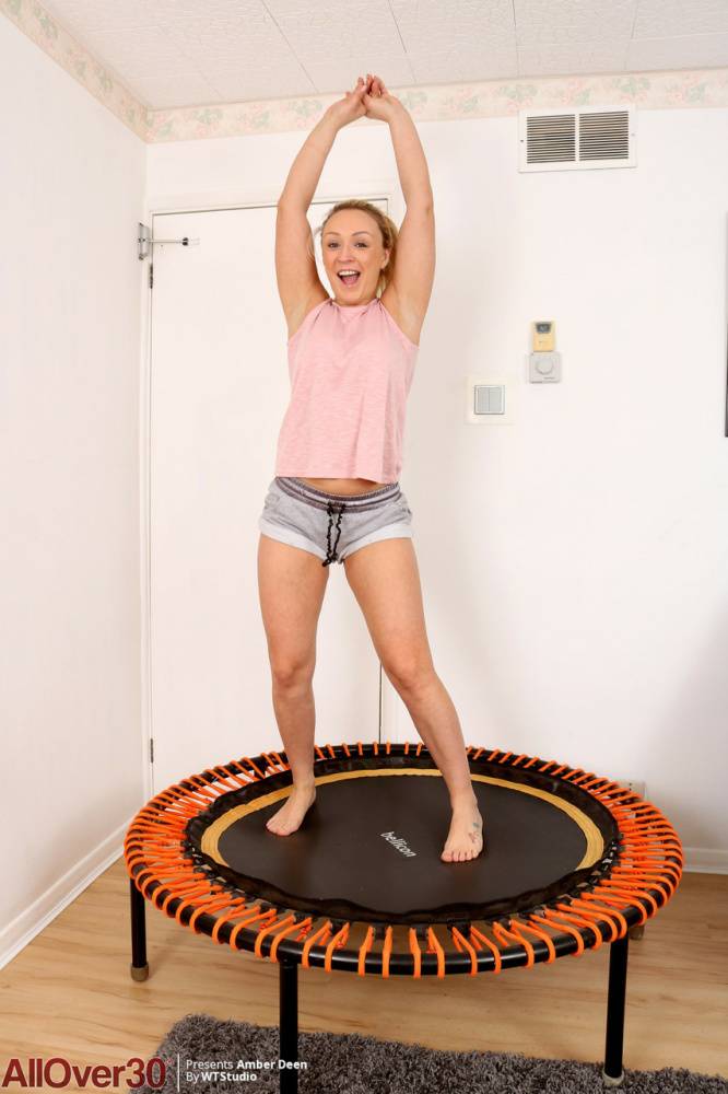 Over 30 blonde Amber Deen gets totally naked on an indoor trampoline - #16