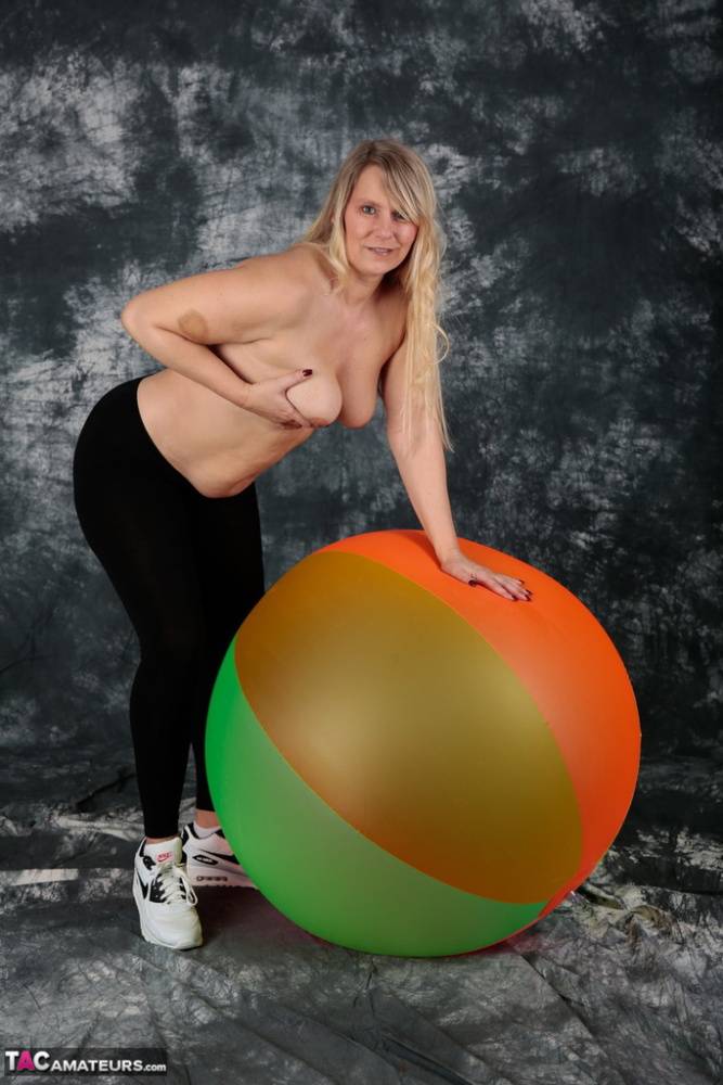 Blonde amateur Sweet Susi gets totally naked on top of a bouncy ball - #8