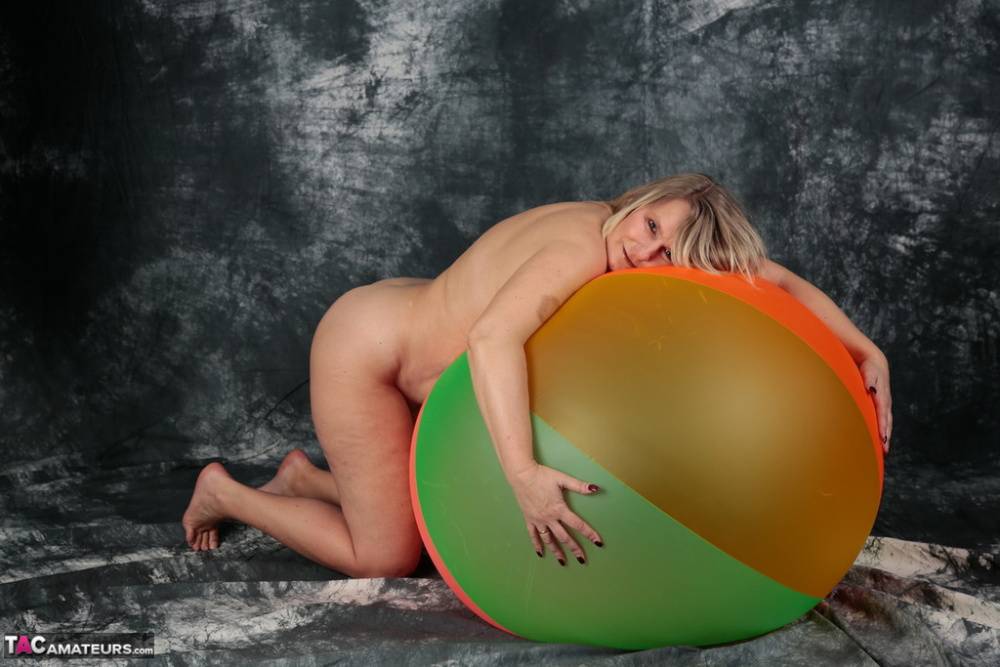 Blonde amateur Sweet Susi gets totally naked on top of a bouncy ball - #3