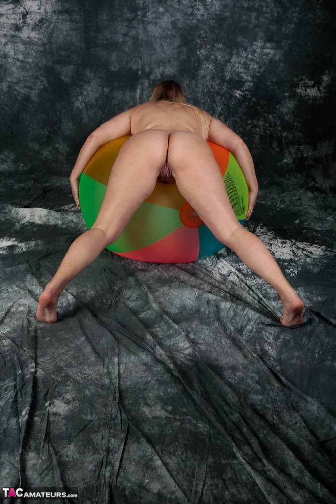 Blonde amateur Sweet Susi gets totally naked on top of a bouncy ball - #1