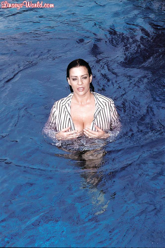 Hairy twat of Linsey Dawn McKenzie shown while cleaning the pool. - #1