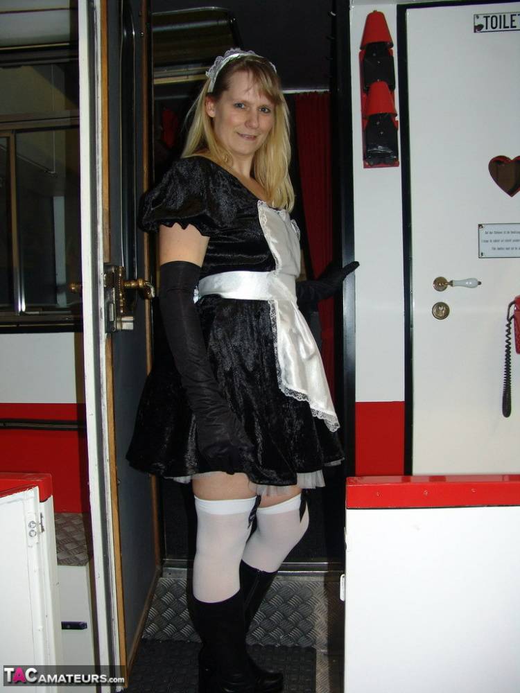 Blonde maid Sweet Susi takes off her uniform while inside a motorhome - #14