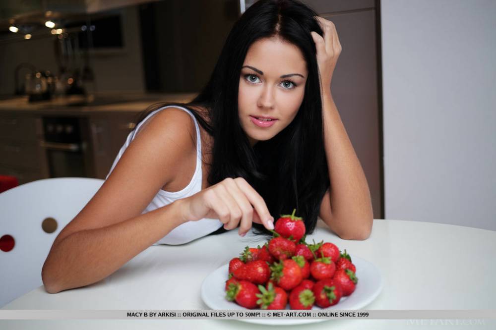 Dark haired teen Macy B shows off her taught body over a bowl of strawberries - #10