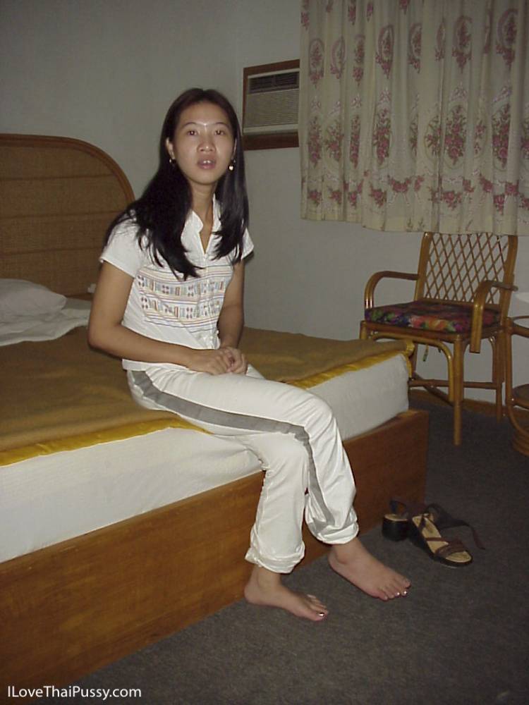 Naughty asian babe taking off her clothes and posing on the bed - #8
