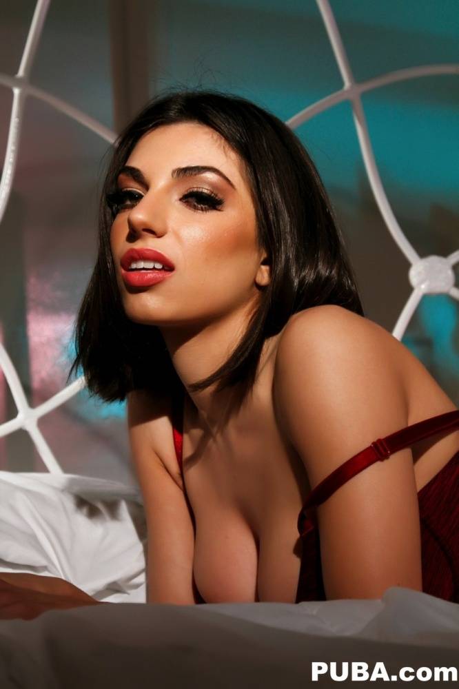 Hot girl Darcie Dolce looses her beautiful tits from a red brassiere on a bed - #3