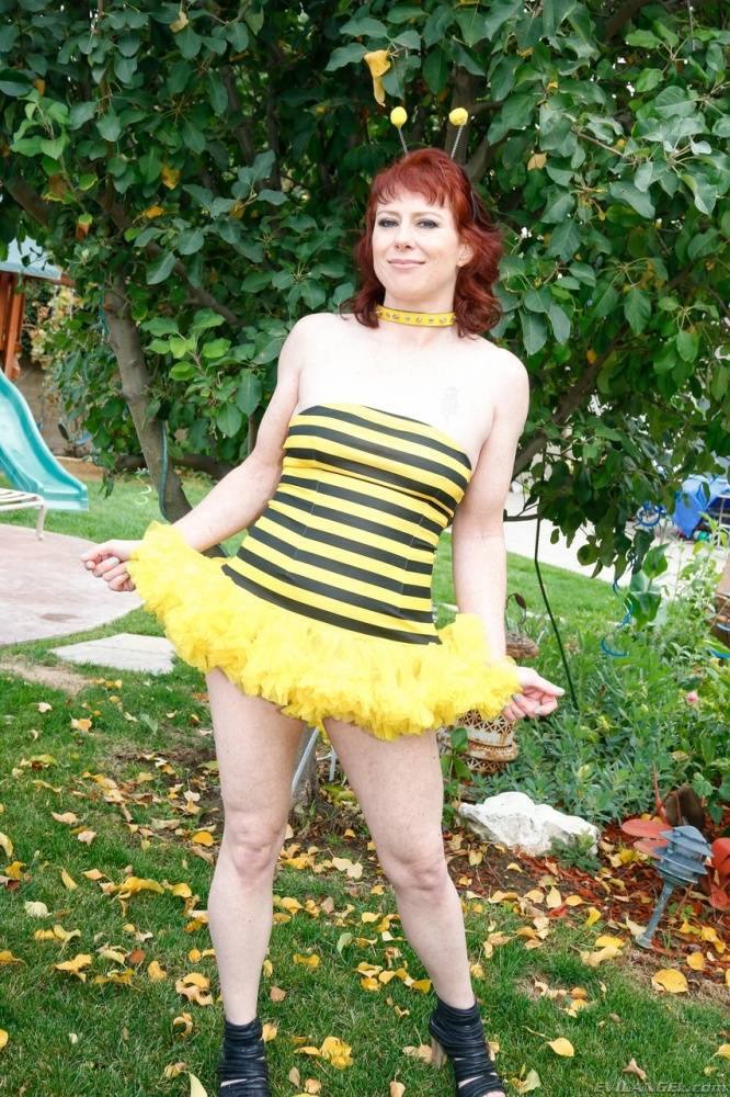 Redhead woman Amber Rayne stretches out her pussy in bumblebee outfit - #1