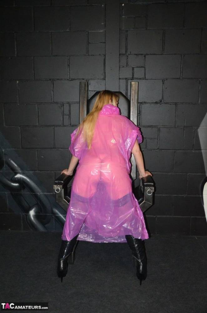 Blonde amateur Sweet Susi releases her tits and twat from a see thru raincoat - #9