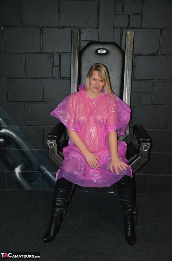 Blonde amateur Sweet Susi releases her tits and twat from a see thru raincoat - #1