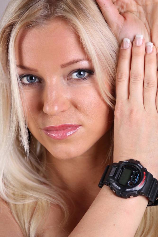 Blonde model Brittany displays her black G-Shock watch during a SFW gig - #1