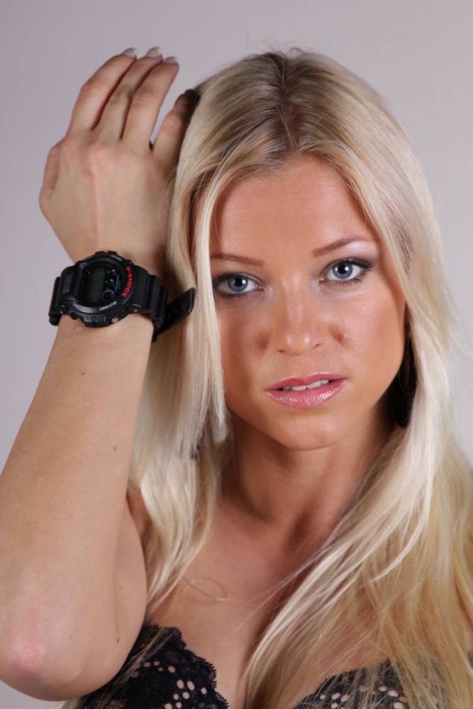 Blonde model Brittany displays her black G-Shock watch during a SFW gig - #8