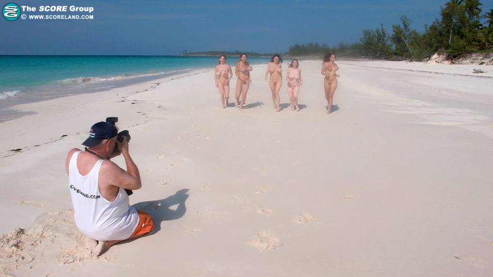 Hot MILF women stripping bikinis to bare big tits on the beach - #2