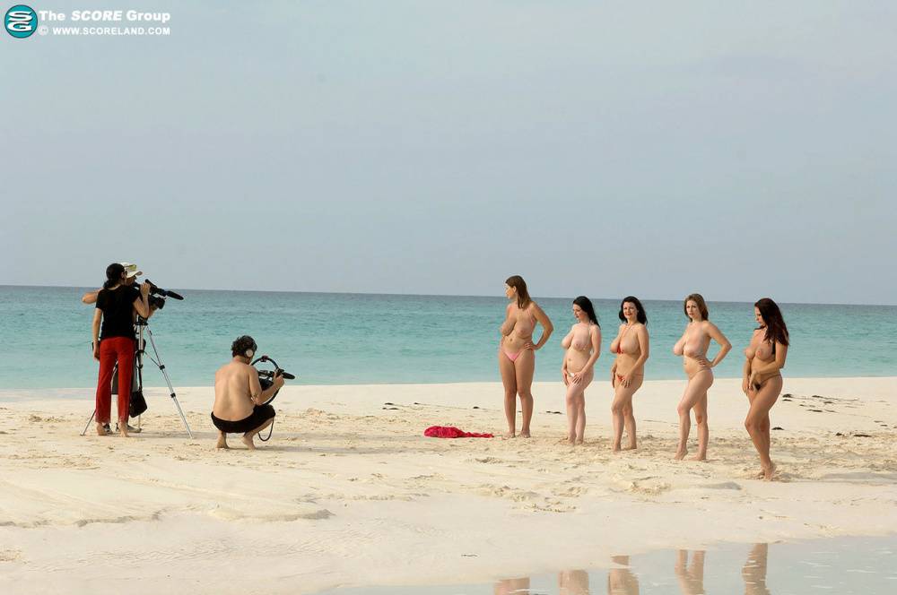Hot MILF women stripping bikinis to bare big tits on the beach - #1