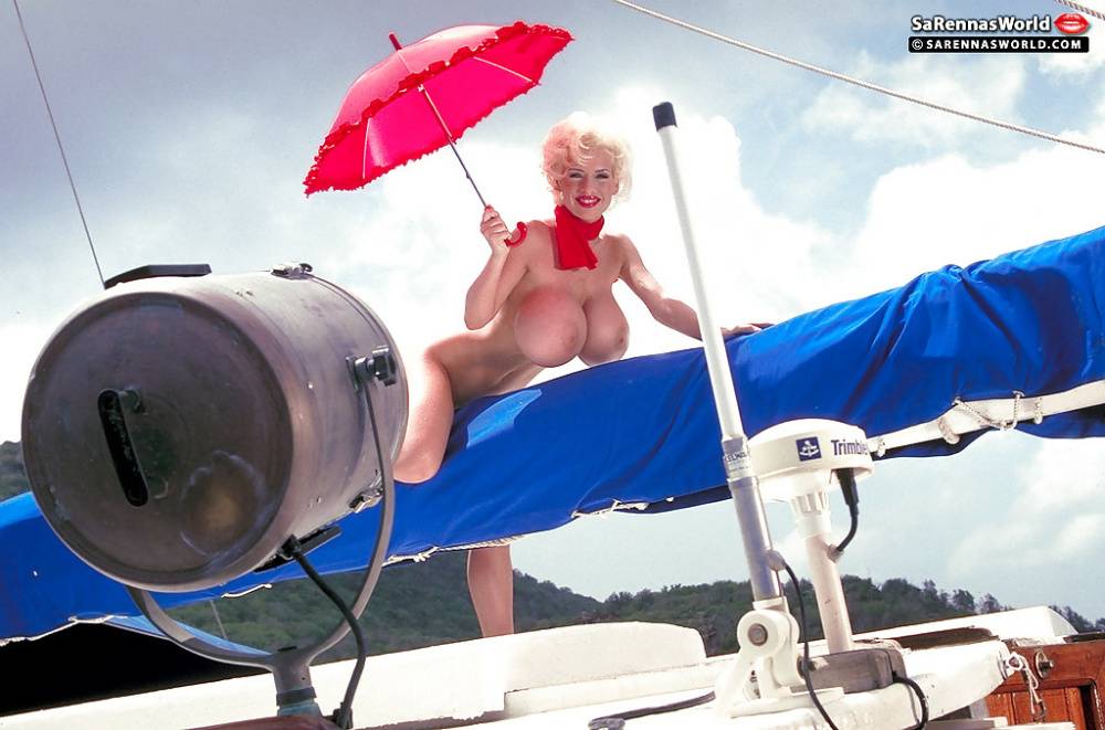 Platinum blonde pornstar SaRenna Lee loosing hooters outdoors on houseboat - #6