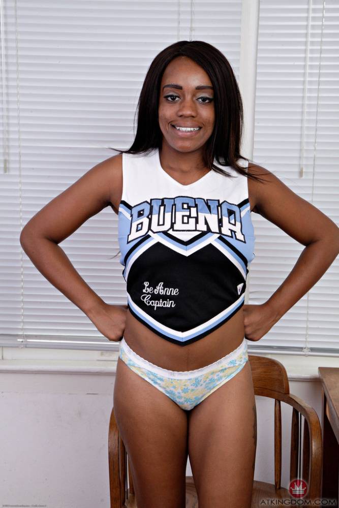 Black amateur removes her cheerleader uniform to model in the nude - #5