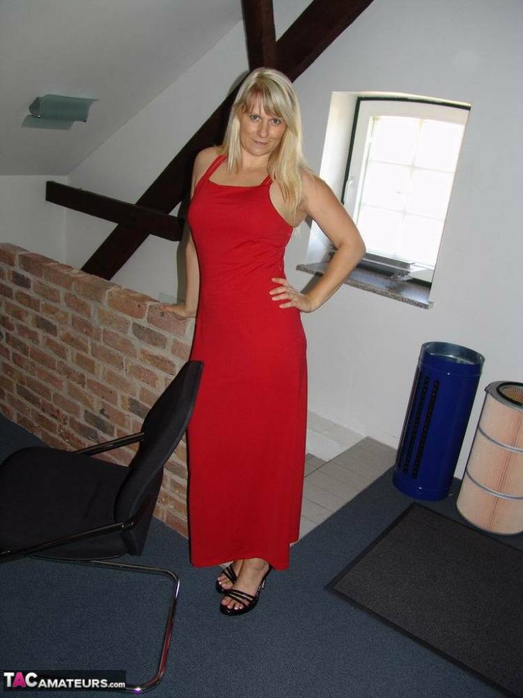 Blonde amateur Sweet Susi divests herself of a long red dress to pose nude - #10