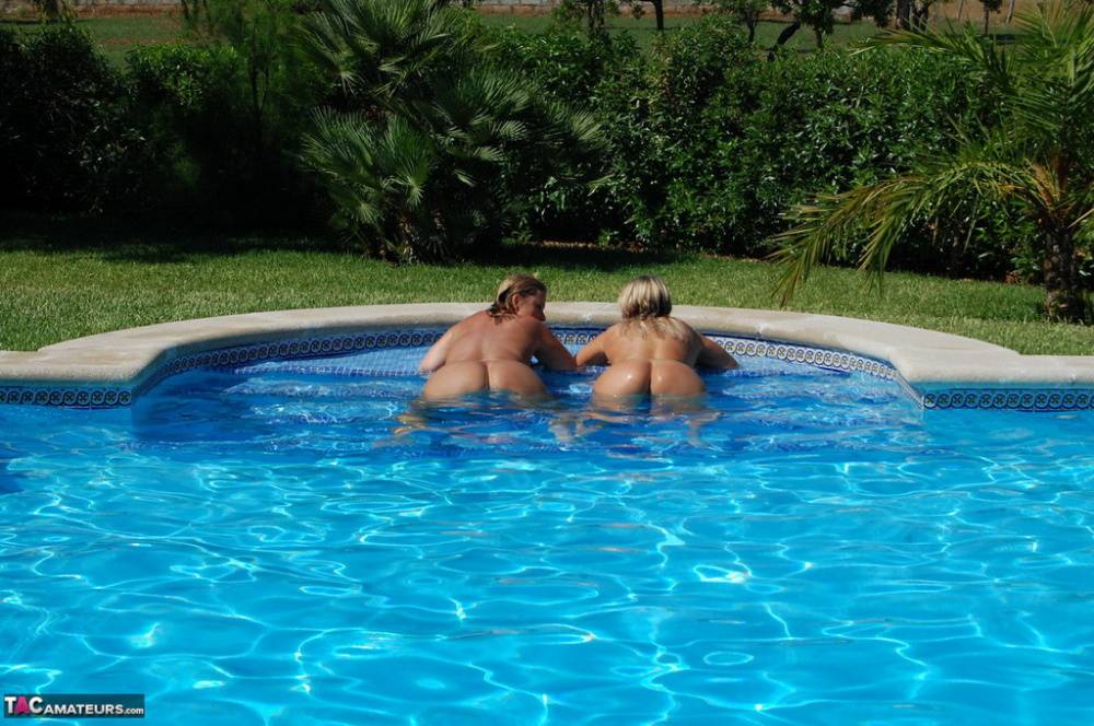 Mature fatty Sweet Susi and a girlfriend hug after showing big butts in a pool - #15