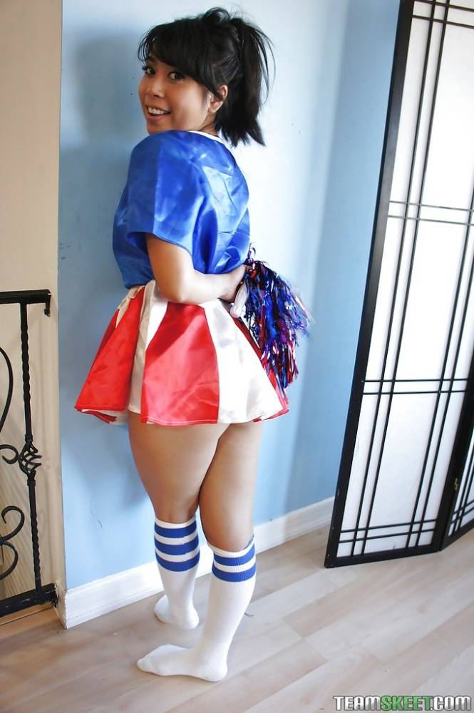 Tiny Asian cheerleader May Lee posing in cute uniform and socks - #15