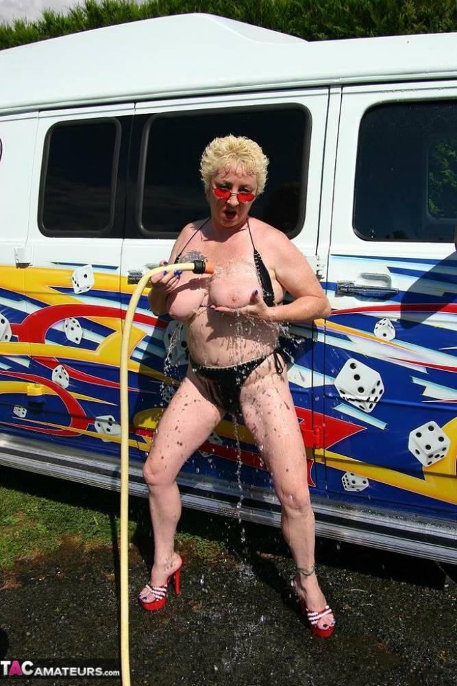 Mature blonde Mary Bitch gets bare naked while washing a class B motorhome - #4