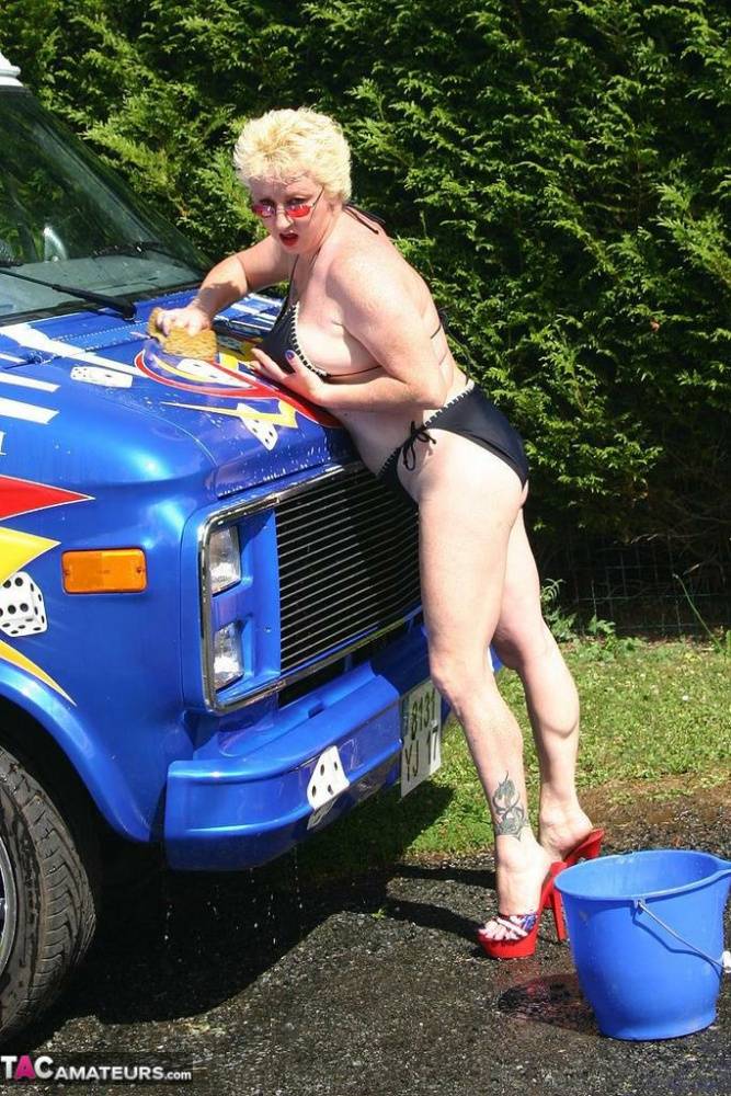 Mature blonde Mary Bitch gets bare naked while washing a class B motorhome - #10