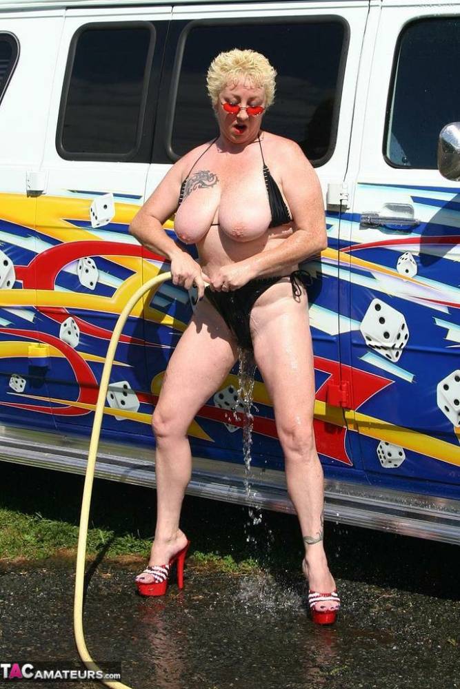Mature blonde Mary Bitch gets bare naked while washing a class B motorhome - #5