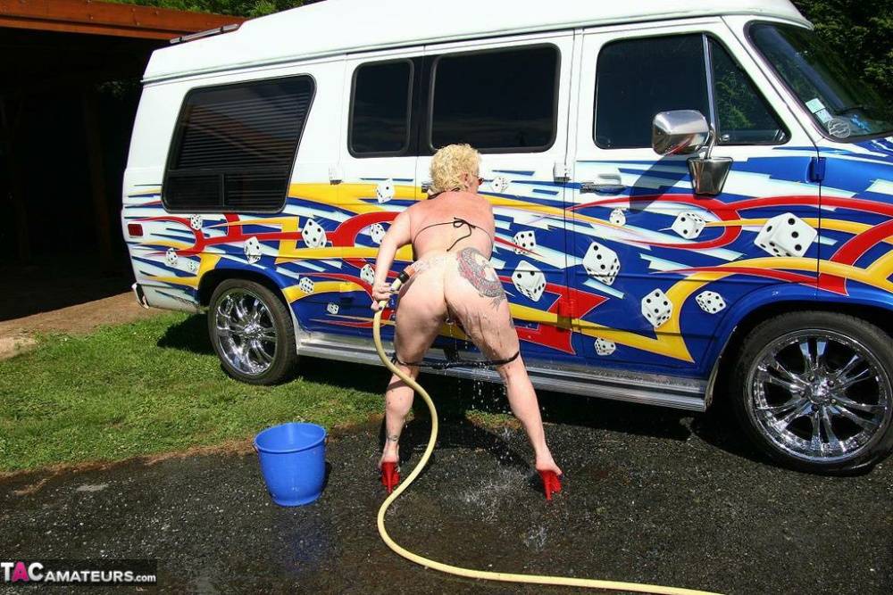 Mature blonde Mary Bitch gets bare naked while washing a class B motorhome - #15