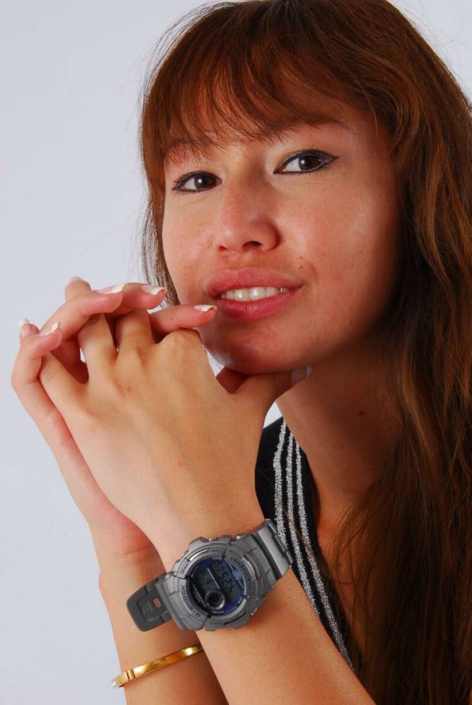 Asian redhead Evita models a grey G-Shock watch while fully clothed - #1