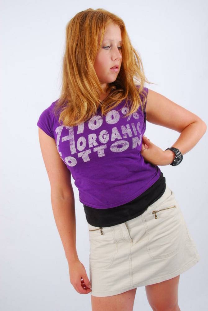 Natural redhead Judy models a black G-Shock watch while fully clothed - #1