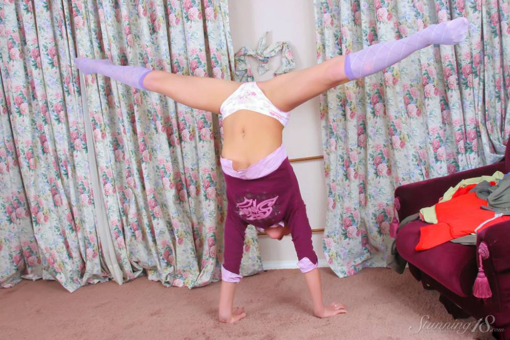 Young looking girl Bella D does a handstand before getting naked in knee socks - #3