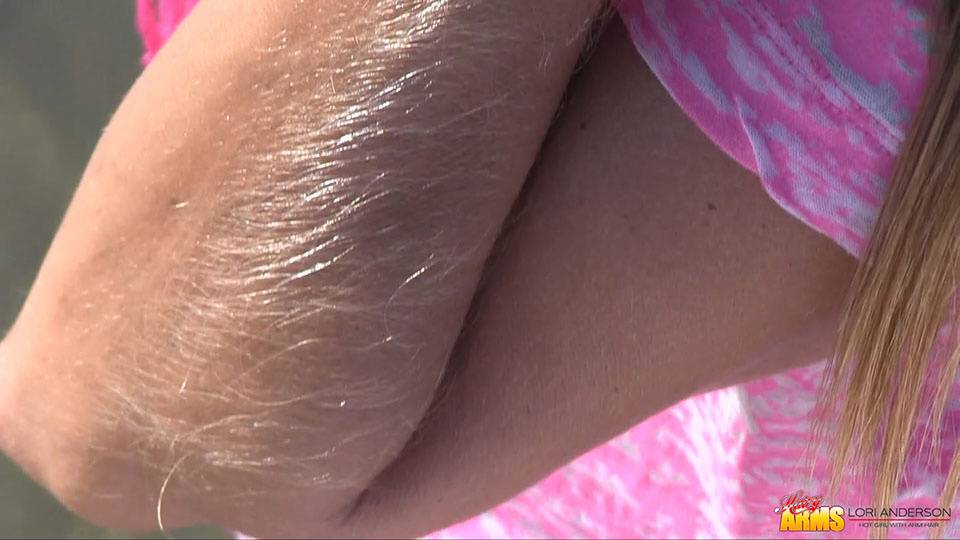 Amateur chick Lori Anderson shows off incredibly hairy forearms by the water - #5