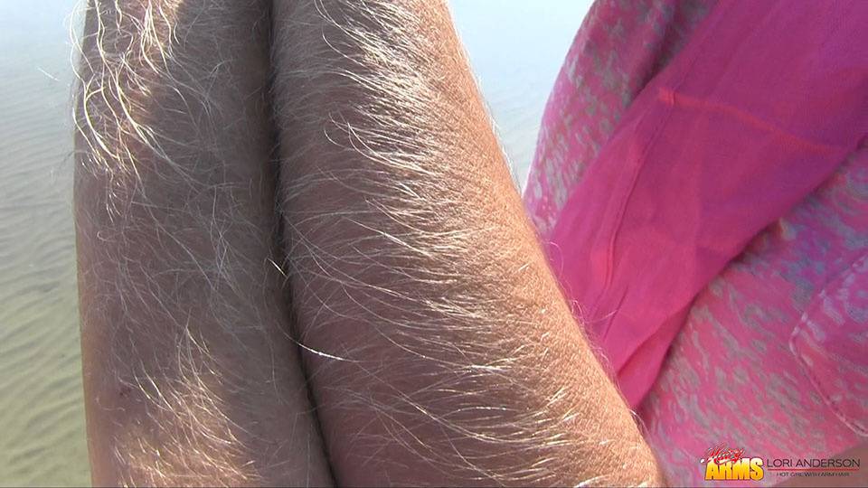 Amateur chick Lori Anderson shows off incredibly hairy forearms by the water - #8