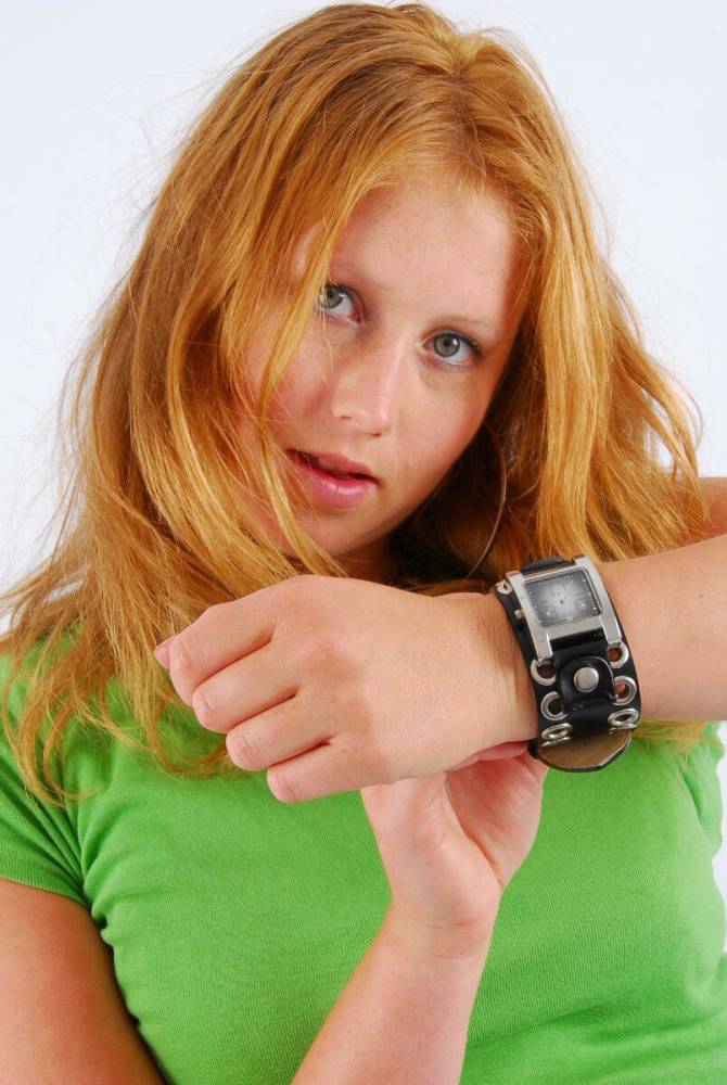 Natural redhead Judy models a double buckle cuff watch during SFW action - #8