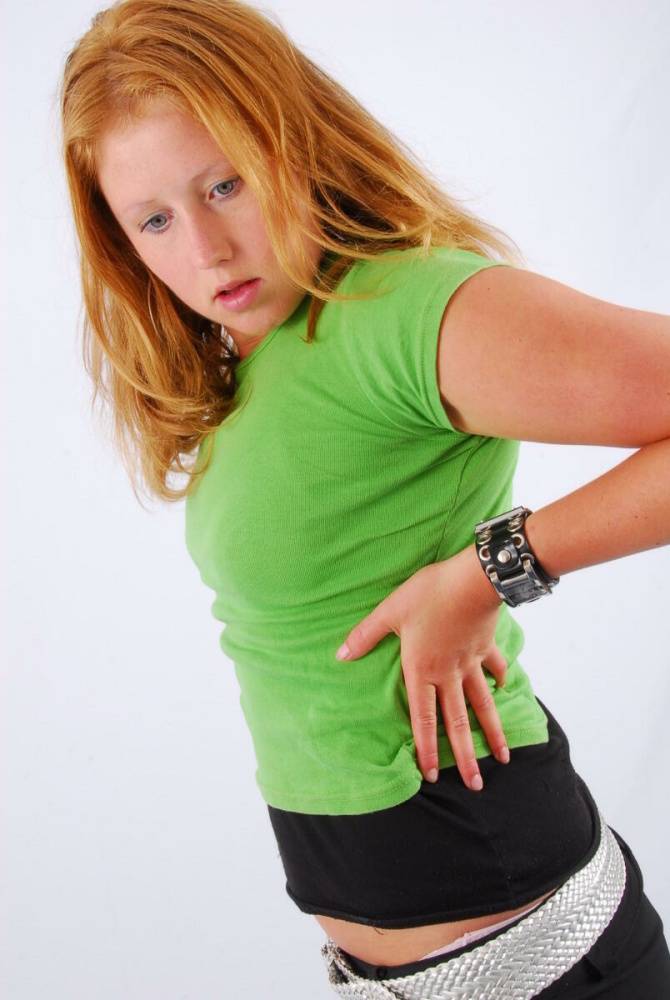 Natural redhead Judy models a double buckle cuff watch during SFW action - #10