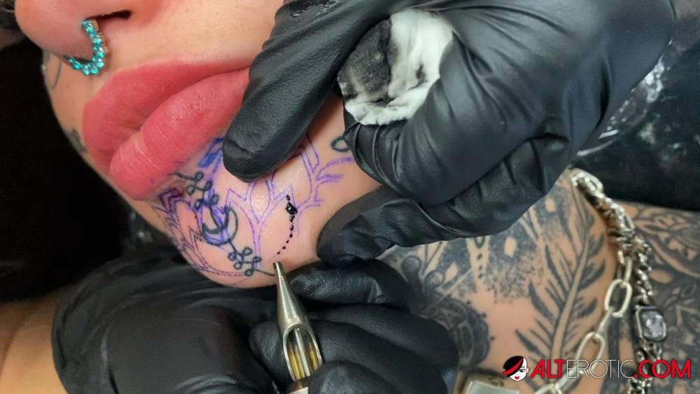 Tattoo enthusiast Amber Luke gets a new face tat from a female artist - #8