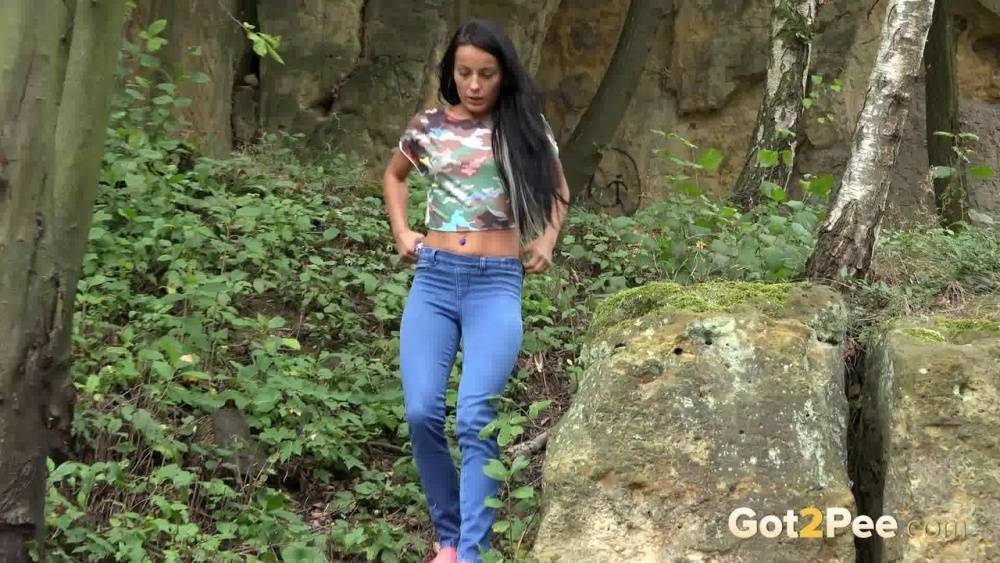 Brunette Lexi gets short taken and has to remove her jeans to piss in the bush - #1