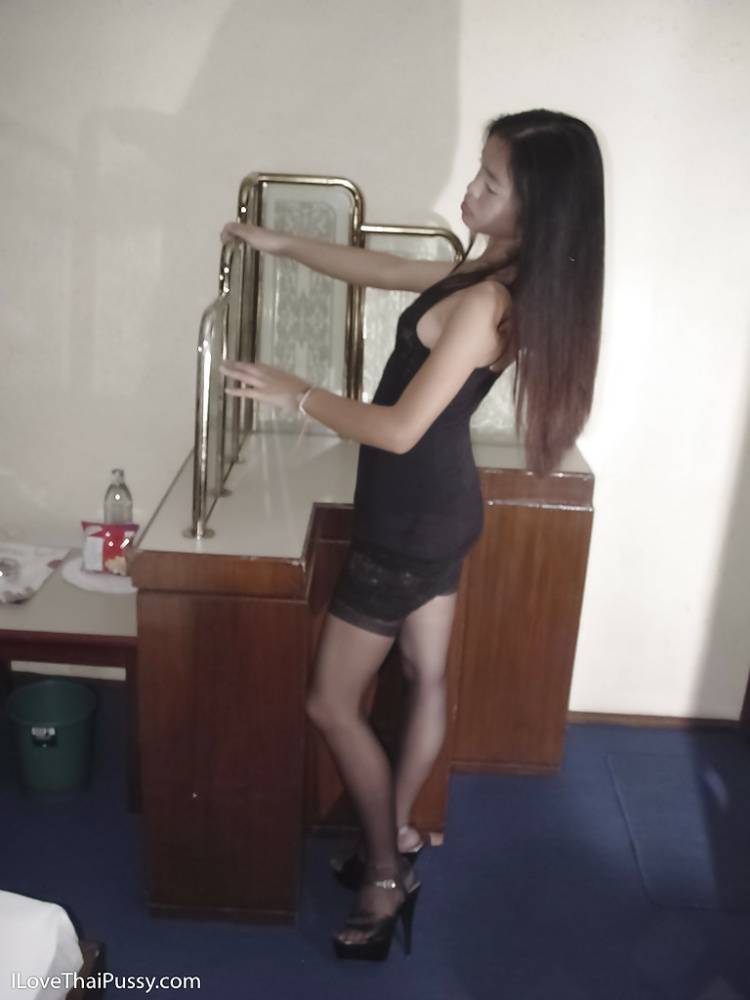 Sexy brunette Thai chick Fon spreading nylon clad legs in high heels - #4