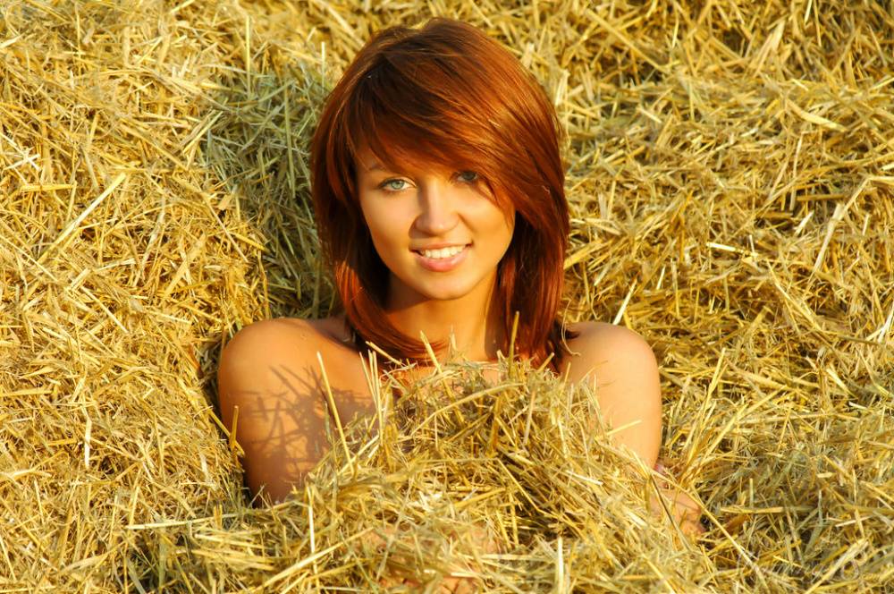 Barely legal redhead Charmian I models totally naked on top of a pile of straw - #15