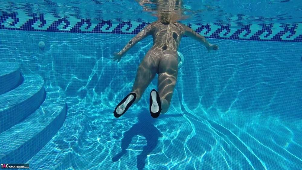 Older blonde Sweet Susi masturbates while mostly underwater in a pool - #1