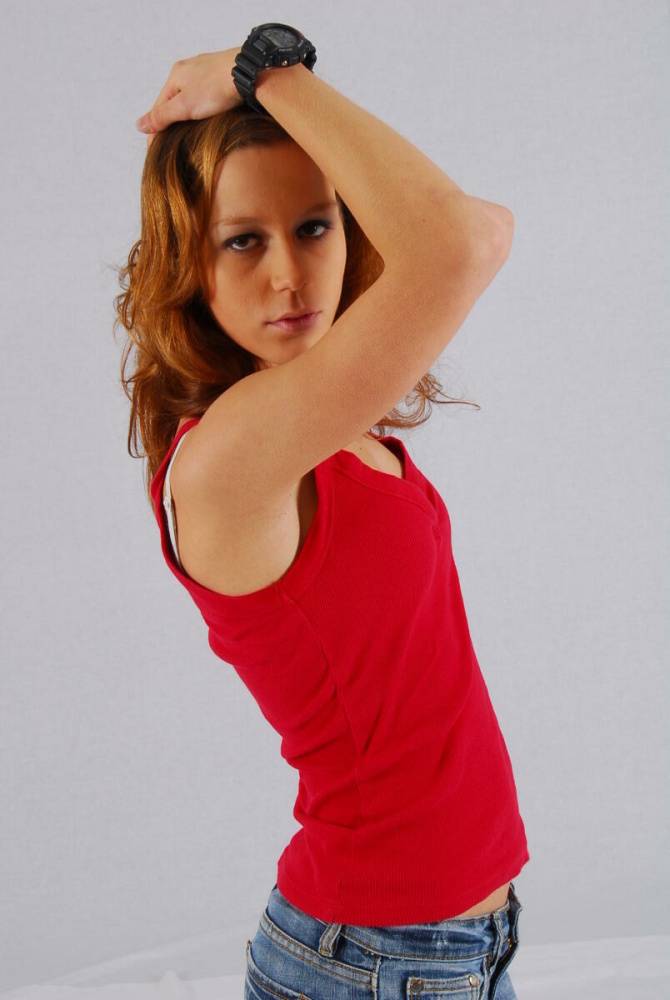 Natural redhead Sabine shows off her black G-shock watch while fully clothed - #8