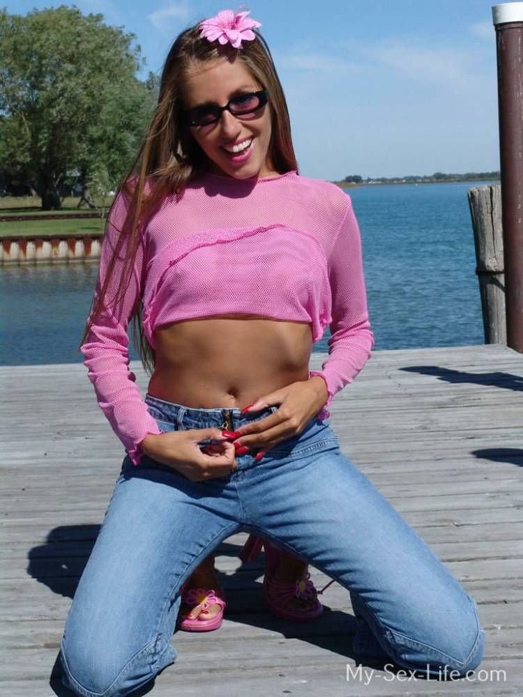 Amateur model Lori Anderson showcases her bald pussy on a public dock - #7