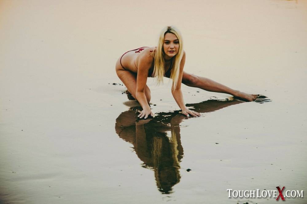 Blonde chick Kenna James models on a beach before an intense fuck indoors - #11