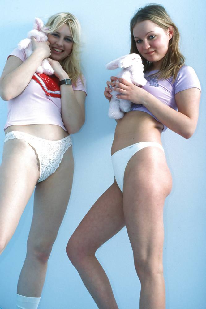 Playful teenage chicks in white socks have some lesbian fun on the bed - #6
